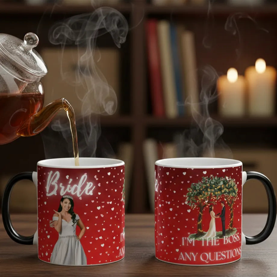 Two red mugs with printed designs being filled with steaming hot liquid, set against a cozy background.