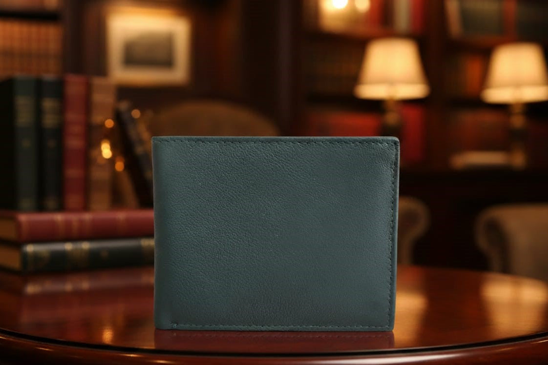 Blue leather wallet on a wooden table with a blurred bookshelf background